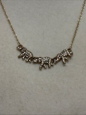 vintage J.Crew gold-tone rhinestone elephant trio necklace.